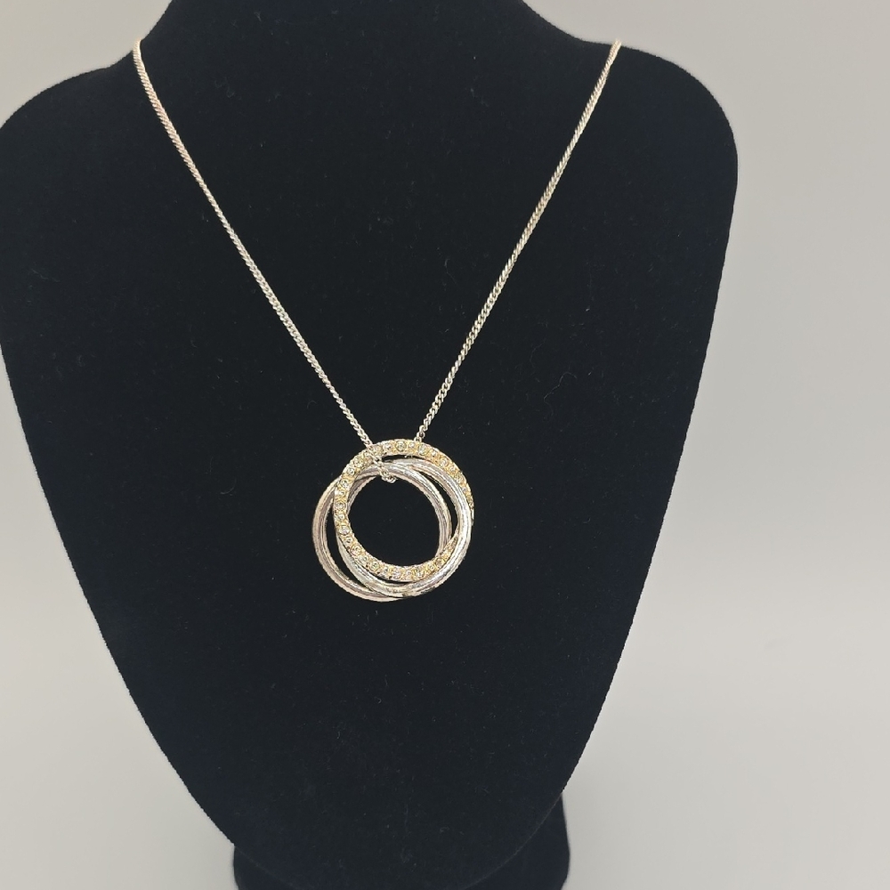 Elegant Gold and Silver Interlocking Necklace